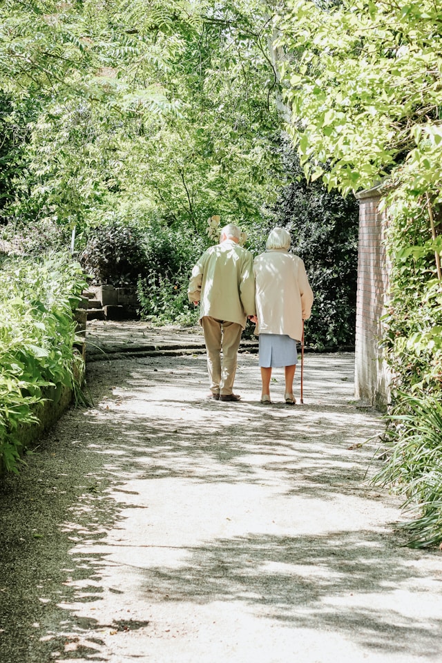 residents walking along a paved path